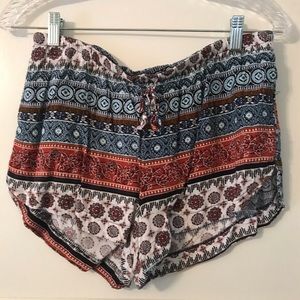 Full tilt flowy patterned shorts w/ tied waist